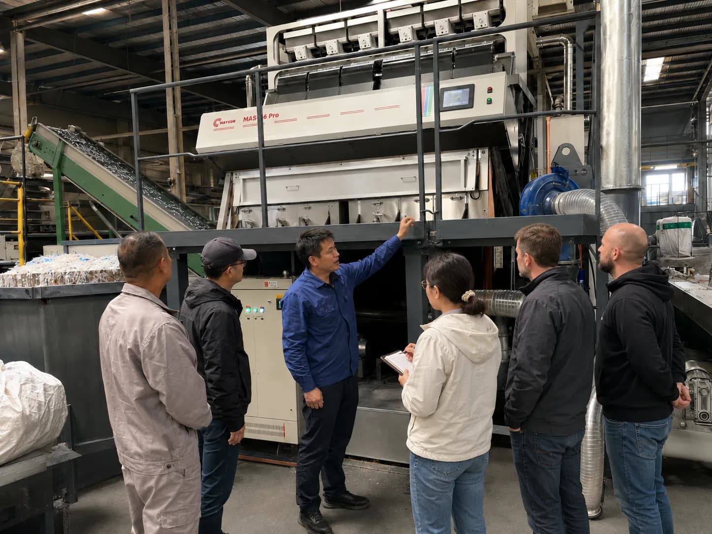 Mayson engineer training a customer operator team at an installed sorter